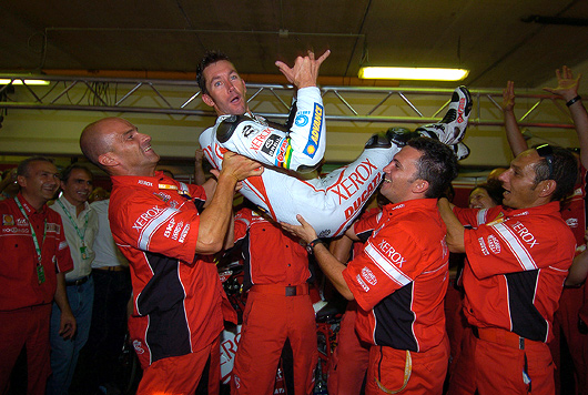 Troy Bayliss celebrates 2006 SBK World Superbike Championship title with Xerox Ducati team.