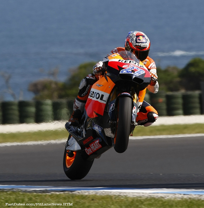 Casey Stoner Phillip Island MotoGP action wheelie photo