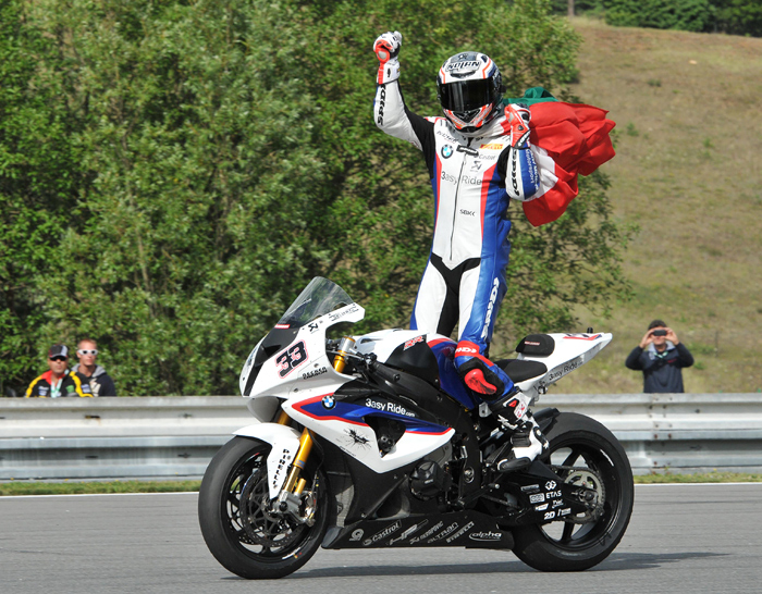 Marco Melandri stnding on BMS Superbike