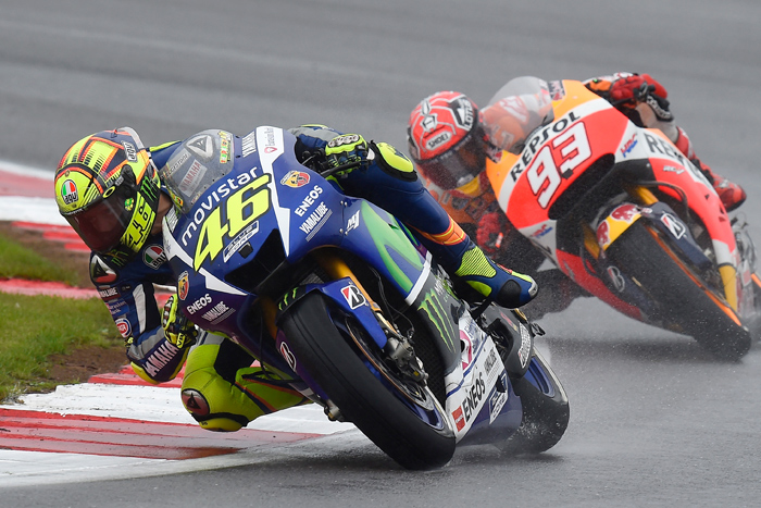 Rossi Marquez Silversone 215 motoGP race action photo